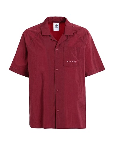 ADIDAS ORIGINALS Einfarbiges Hemd RIFTA Metro SS Shirt
 Bordeaux 100% Recyceltes Polyamid