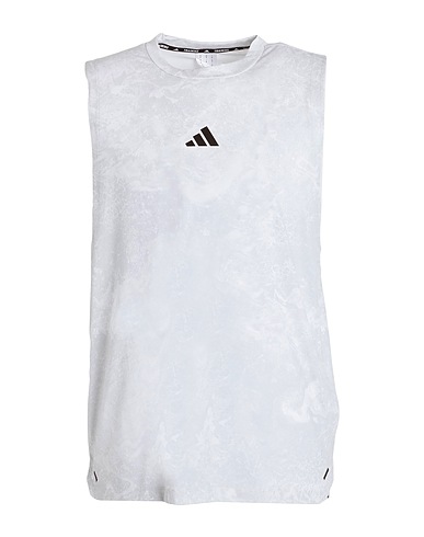 ADIDAS T-shirt WO POW TANK
81% Poliestere riciclato, 14% Lyocell, 5% Elastan
