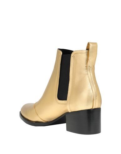 Shop Rag Bone Ankle Boots In Gold