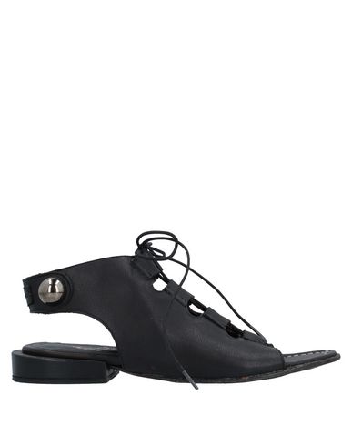 Click to view more detailed imagery on our partner's website Le Ruemarcel Sandals In Black
