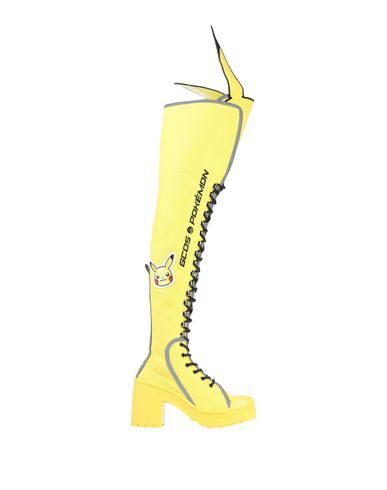 boots with yellow logo on sole