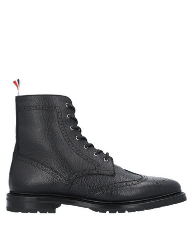 Click to view more detailed imagery on our partner's website Thom Browne Ankle Boots In Black