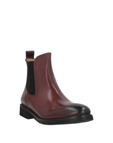 Calpierre Ankle Boots In Brown