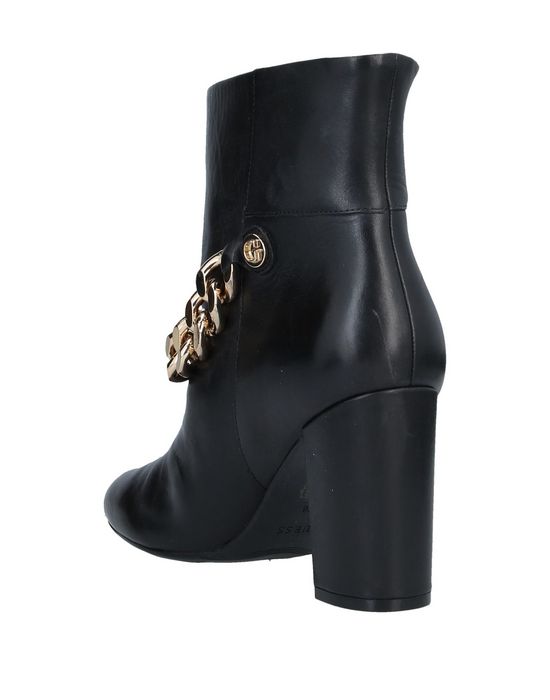 GUESS Полусапоги и высокие ботинки