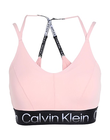 CALVIN KLEIN PERFORMANCE Athletic tops Pink 78% Recycled polyester, 22% Elastane