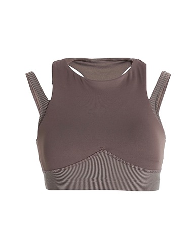 REEBOK Top BRA STUDIO LAYERED
 Taupe 85% Recycled polyester, 15% Elastane