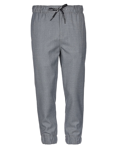 ZOOM CALVIN KLEIN JEANS - Casual pants