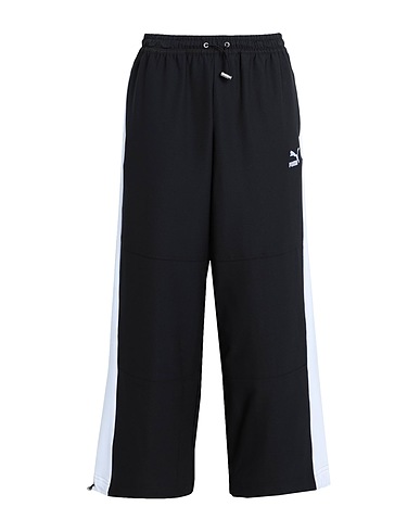 PUMA Activewear LUXE SPORT T7 Slouchy Pant
 Black 90% Polyester, 10% Elastane