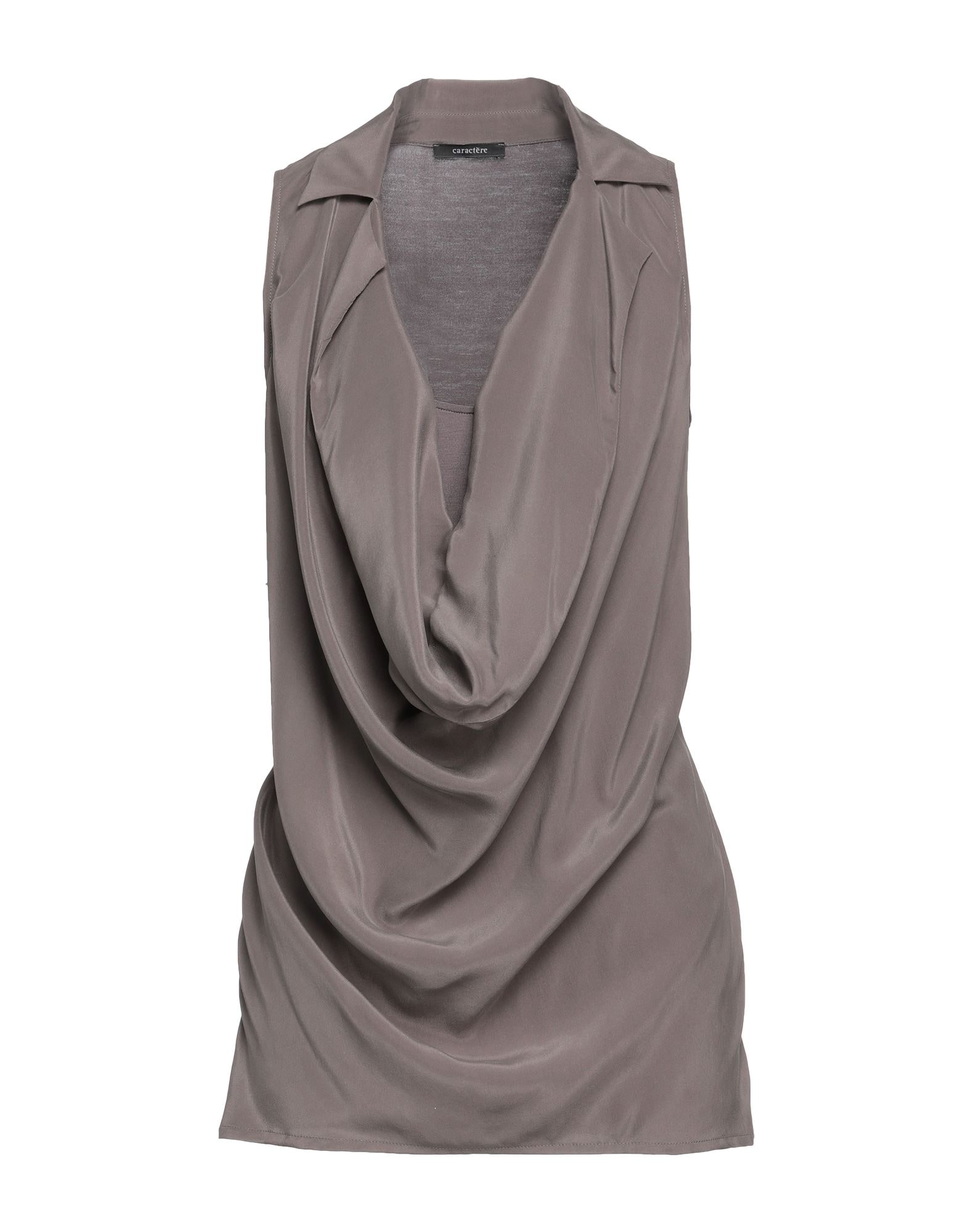 CARACTÈRE - トップス