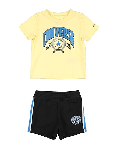 CONVERSE Baby co-ord  CNVB REC CLUB FT SHORT JRSY SS
 Pastel yellow 60% Organic cotton, 40% Polyester