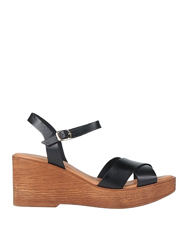 CINZIA SOFT Mules and clogs Black Leather