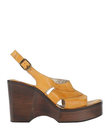 PREVENTI Mules and clogs Marigold Leather