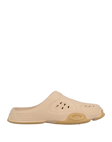 OAKLEY Mules and clogs Beige Rubber