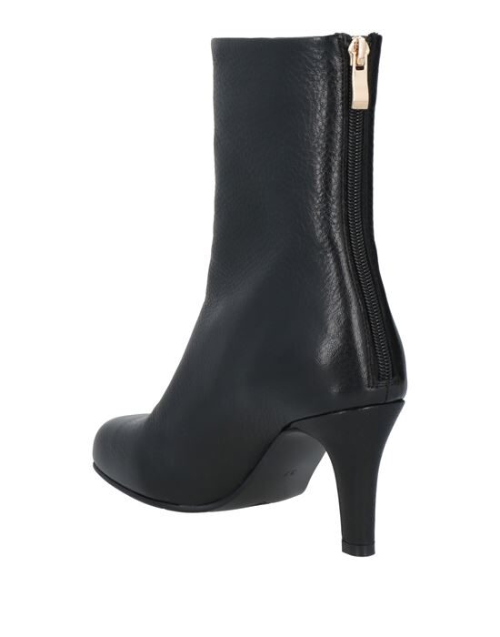 NORA New York Полусапоги и высокие ботинки