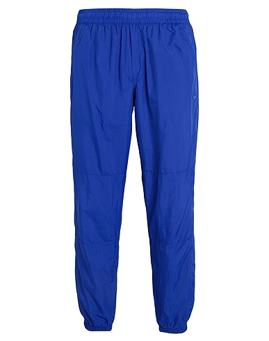 ADIDAS ORIGINALS Casual trouser PREMIUM ESSENTIALS CRINKLE NYLON PANTS Bright blue 100% Recycled polyamide