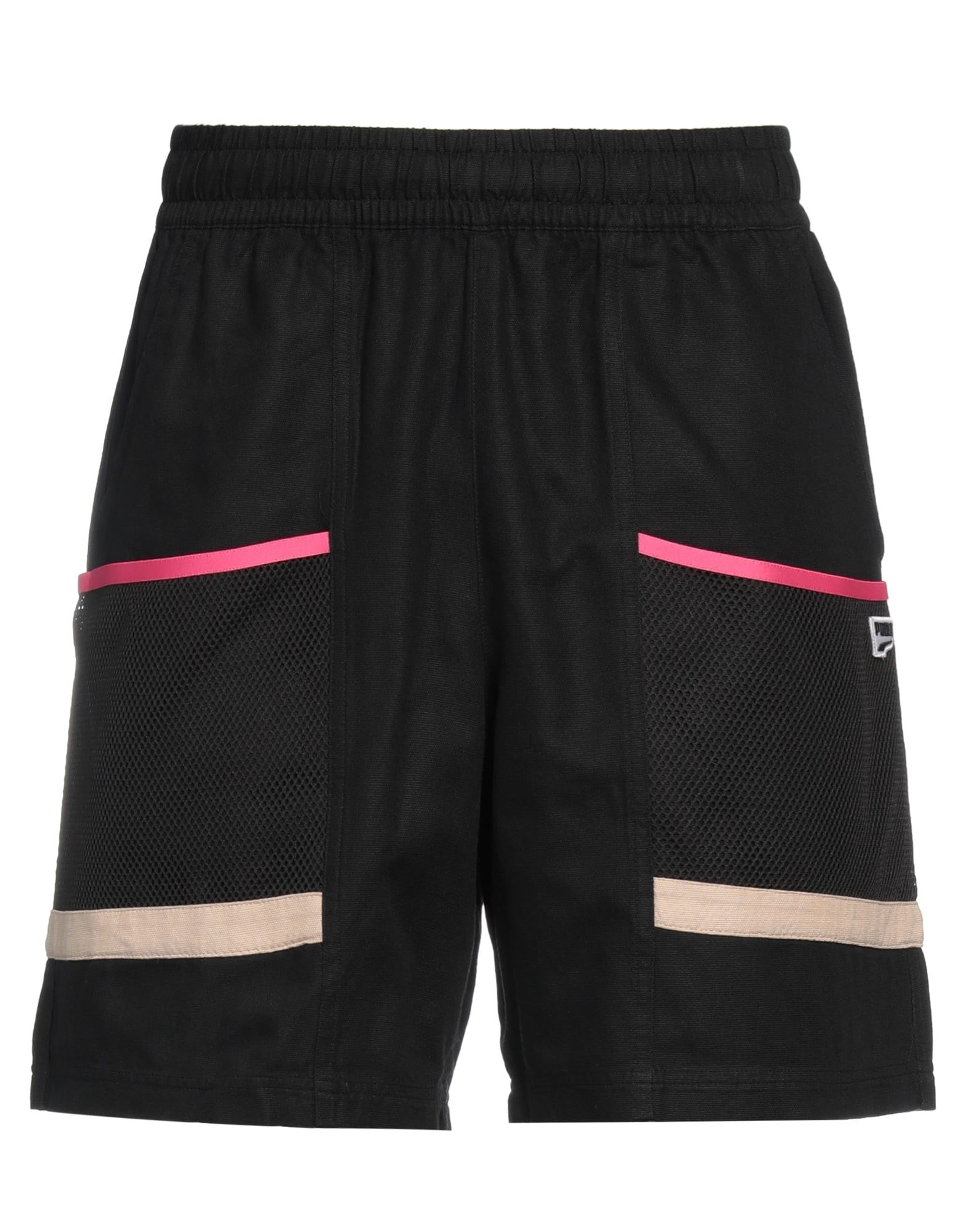 PUMA - Pantalones cortos y bermudas
