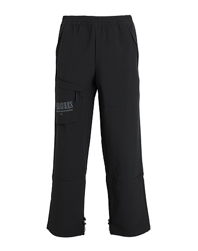 PUMA x PLEASURES Pantalón PUMA x PLEASURES Cargo Pants
 Negro 91% Poliéster, 9% Elastán