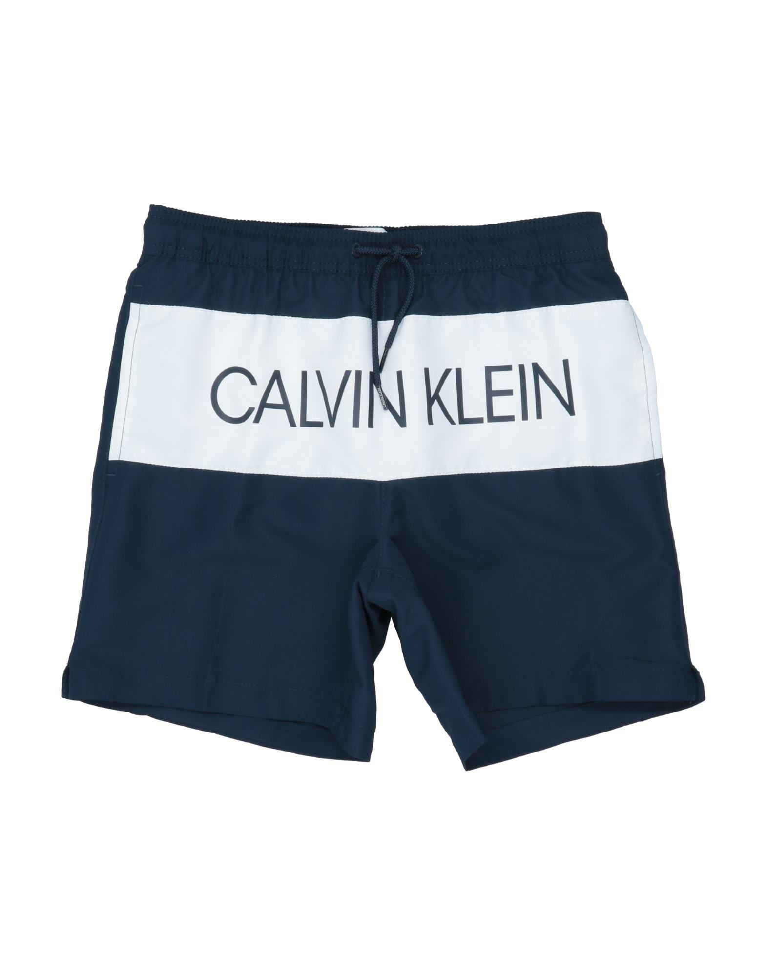 Шорты calvin. Плавательные шорты Кельвин Кляйн. Шорты Кельвин Кляйн мужской. Шорты Кельвин Кляйн мужской для плавания. Шорты для плавания Calvin Klein km0km00738.