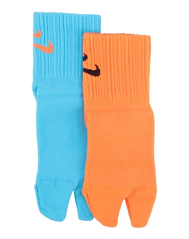 NIKE Calze e Calzini Arancione 48% Nylon, 47% Poliestere, 5% Elastan